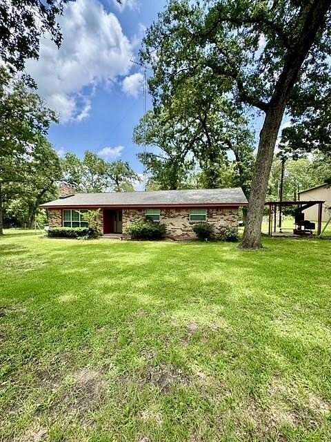 7.3 Acres of Land with Home for Sale in Crockett, Texas