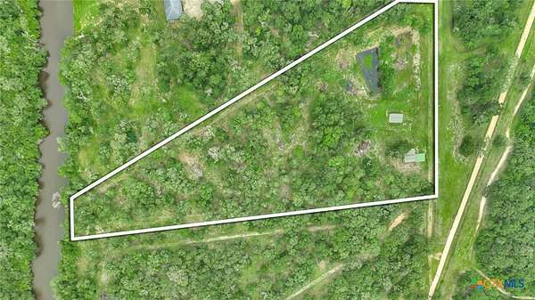 6.6 Acres of Land with Home for Sale in Blessing, Texas