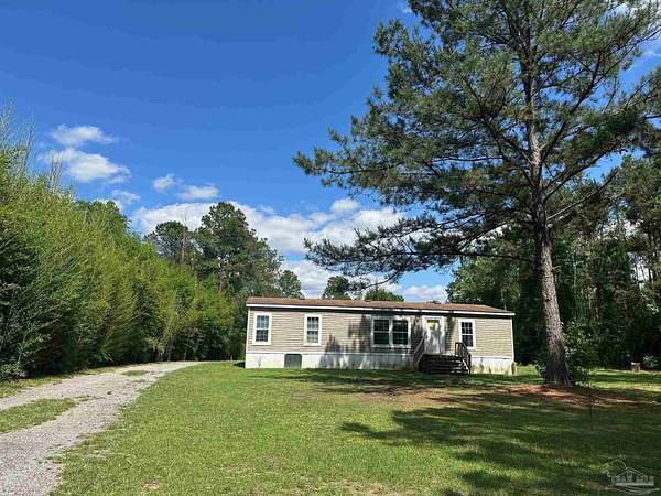 2.13 Acres of Land with Home for Sale in Jay, Florida
