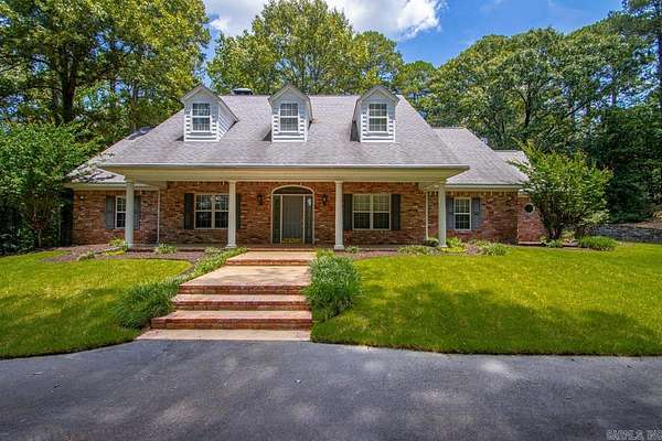7.79 Acres of Land with Home for Sale in Benton, Arkansas