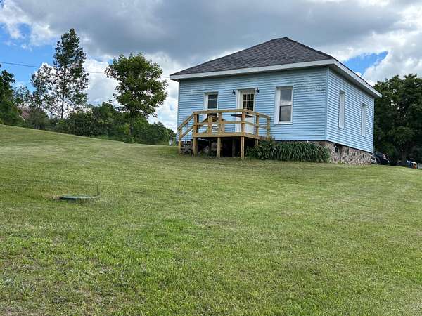 0.5 Acres of Land with Home for Sale in Walkerville, Michigan
