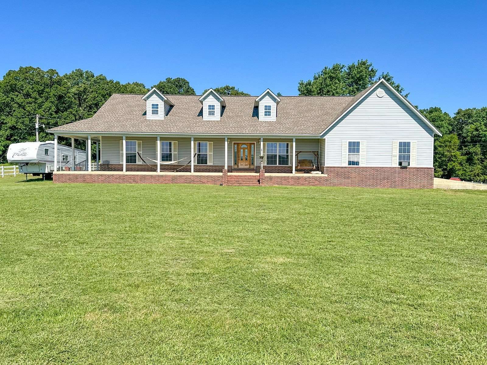 60 Acres of Land with Home for Sale in Evening Shade, Arkansas