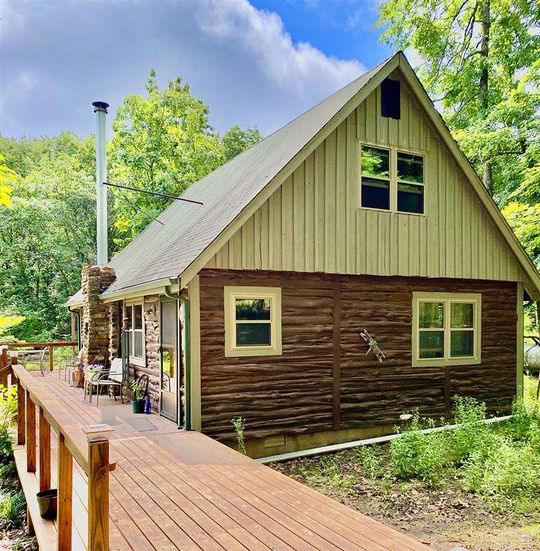 17.6 Acres of Land with Home for Sale in Alpena, Arkansas