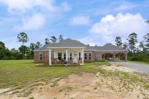 1.85 Acres of Land with Home for Sale in Kiln, Mississippi