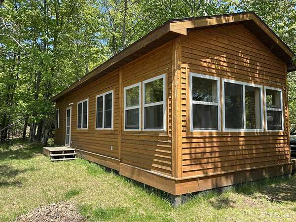 1.3 Acres of Land with Home for Sale in Big Bay, Michigan