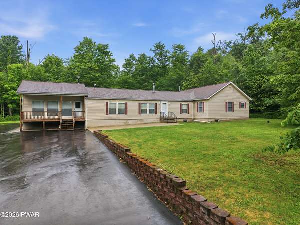 42 Acres of Recreational Land with Home for Sale in Lake Ariel, Pennsylvania