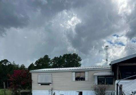 77.4 Acres of Agricultural Land with Home for Sale in Clermont, Florida