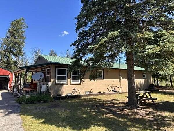 20 Acres of Land with Home for Sale in Irons, Michigan