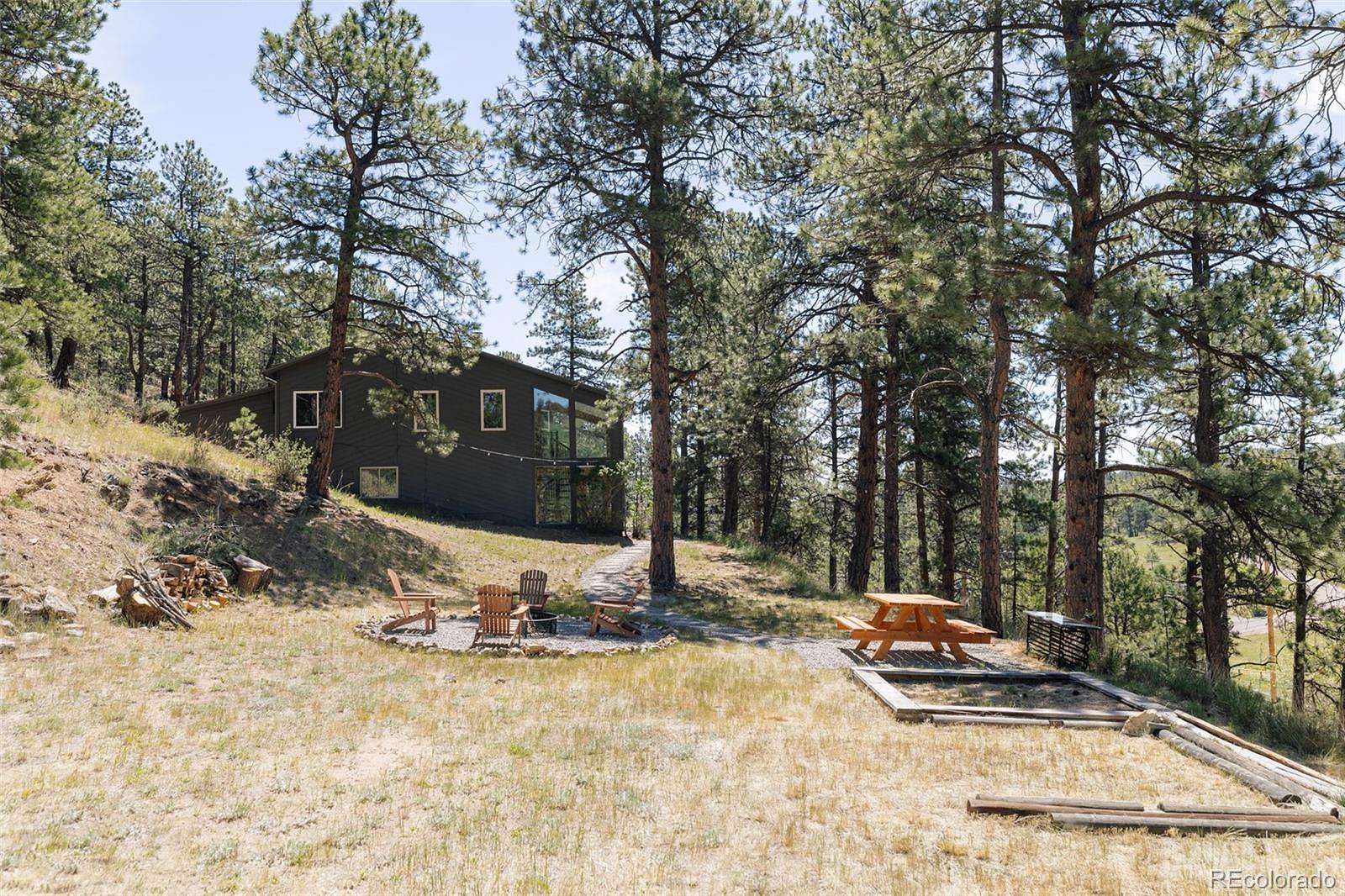 6 Acres of Land with Home for Sale in Evergreen, Colorado