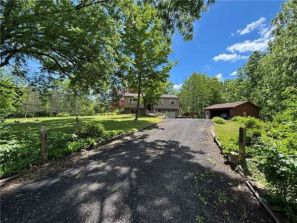 1.69 Acres of Land with Home for Sale in Newark, New York