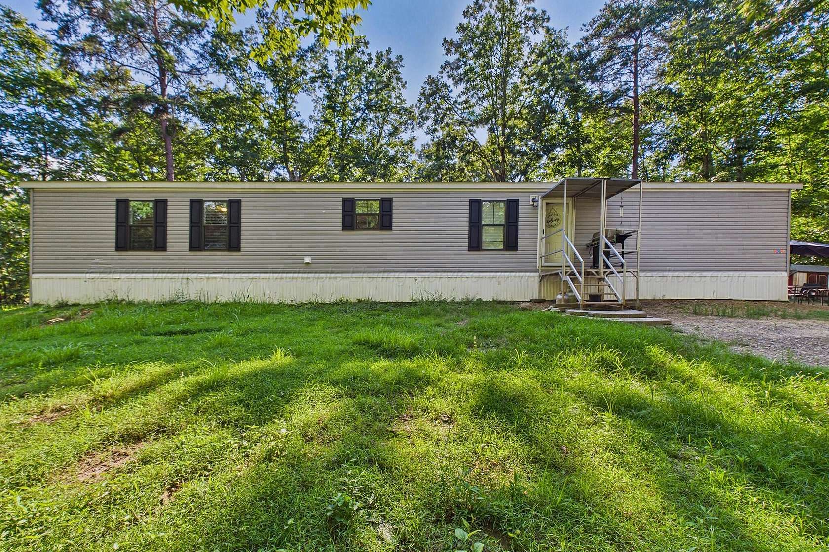 8.5 Acres of Land with Home for Sale in Remlap, Alabama