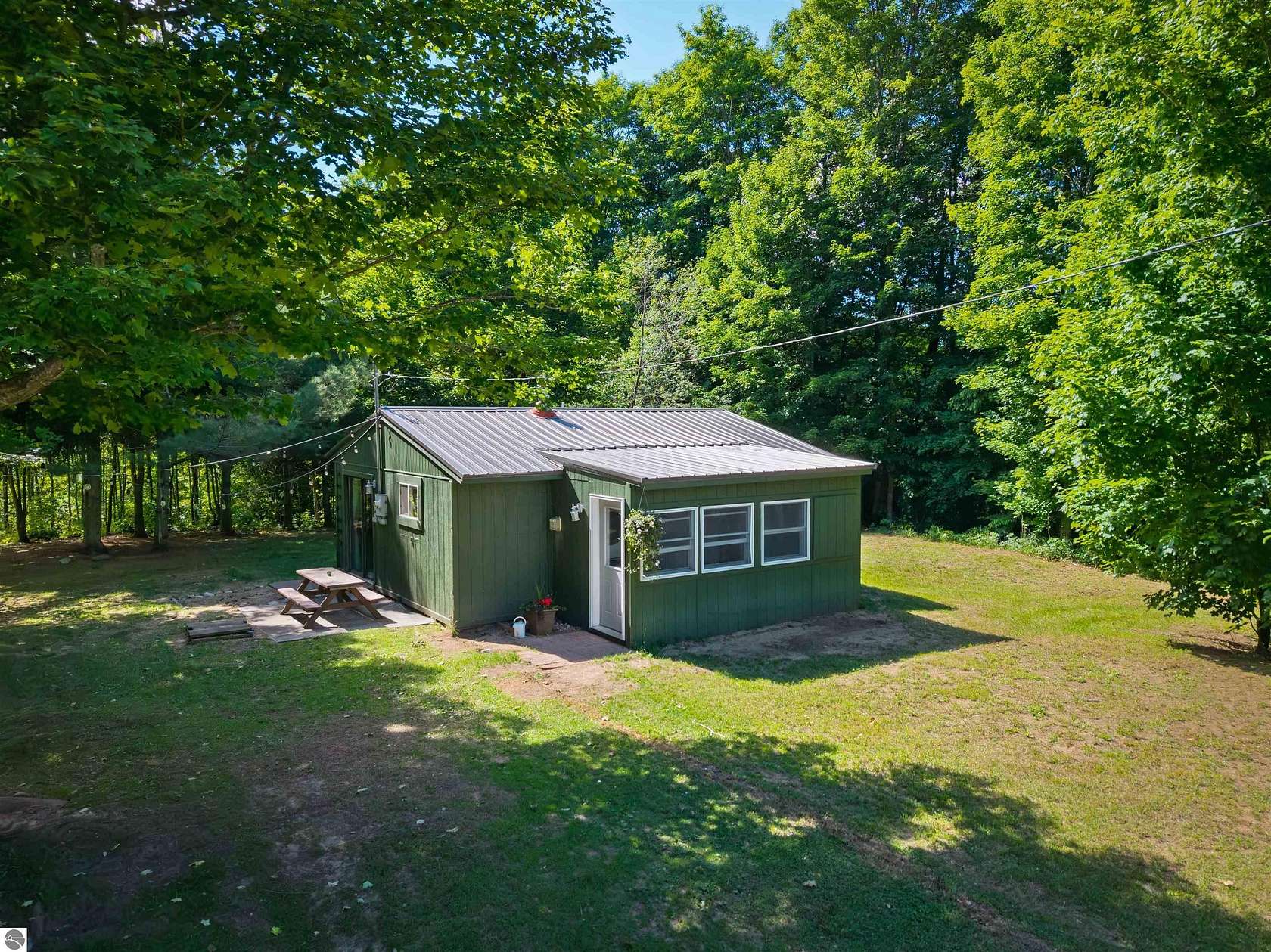 5 Acres of Land with Home for Sale in Mancelona, Michigan