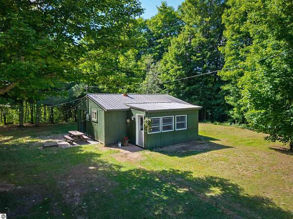 5 Acres of Land with Home for Sale in Mancelona, Michigan