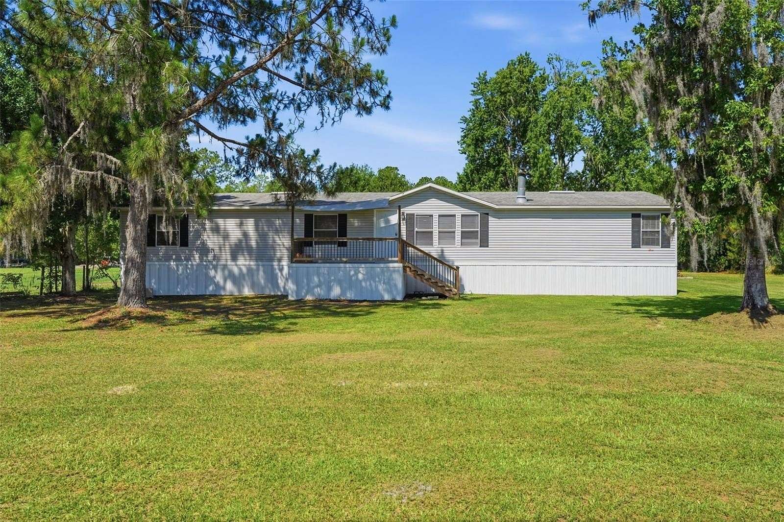6.2 Acres of Land with Home for Sale in Polk City, Florida
