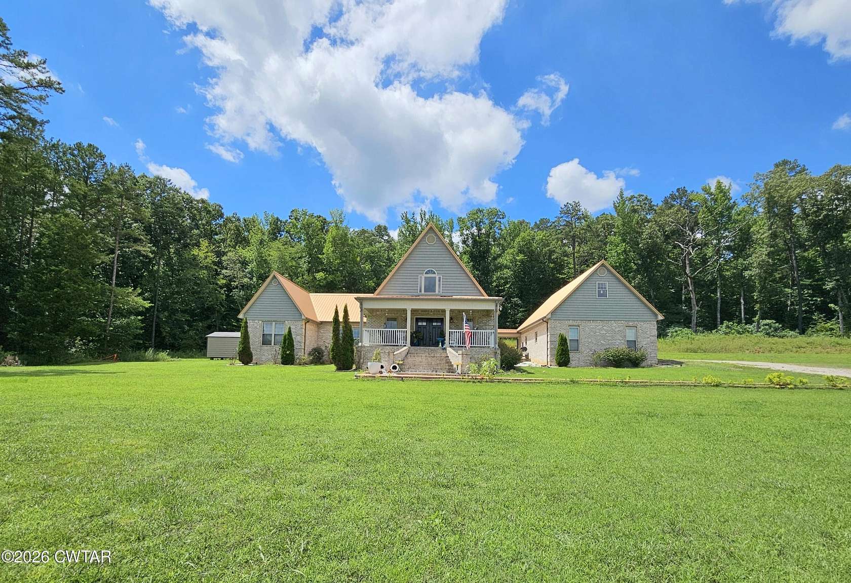 10.4 Acres of Land with Home for Sale in Henderson, Tennessee