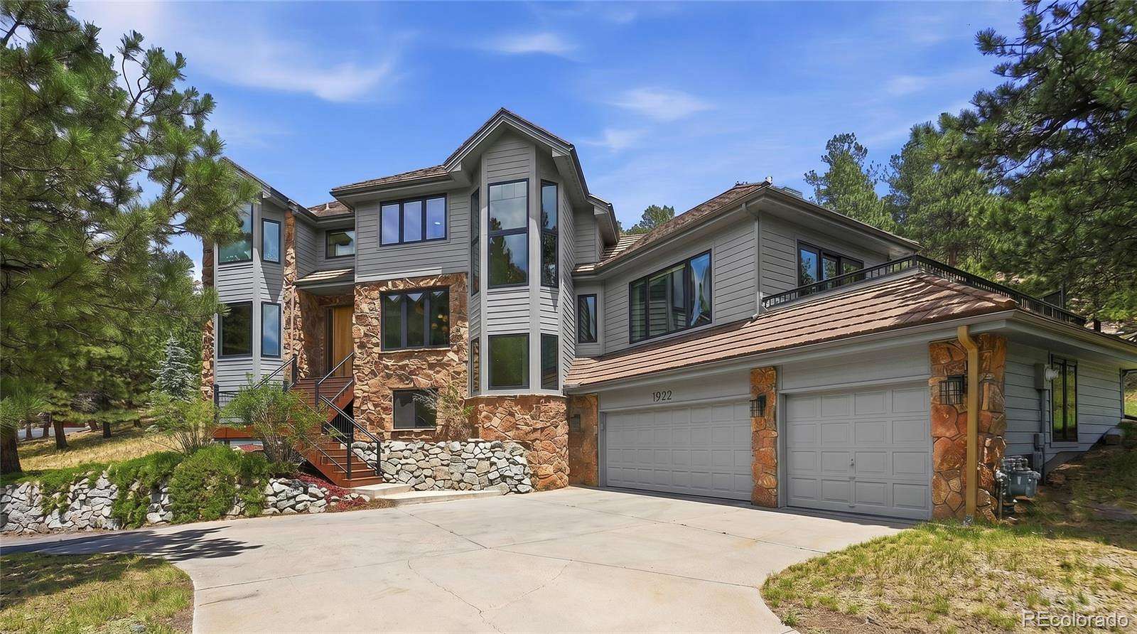 1.83 Acres of Land with Home for Sale in Evergreen, Colorado