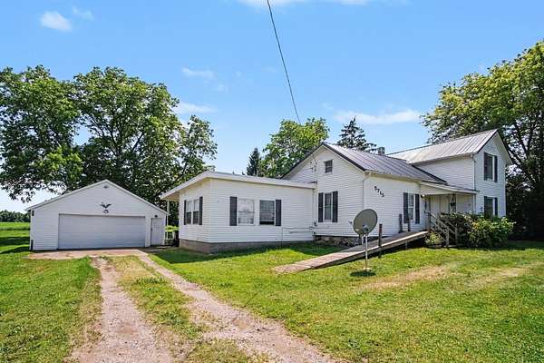 5 Acres of Land with Home for Sale in Saranac, Michigan