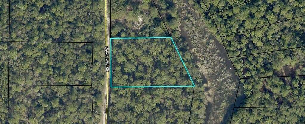 0.99 Acres of Residential Land for Sale in Holt, Florida