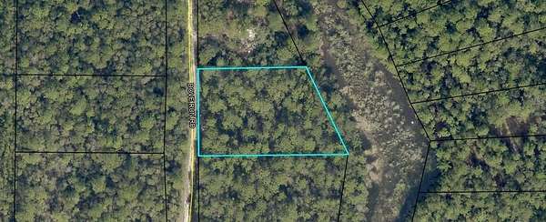 0.99 Acres of Residential Land for Sale in Holt, Florida
