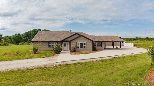 10 Acres of Land with Home for Sale in Warsaw, Missouri