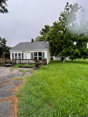 10 Acres of Land with Home for Auction in Miami, Oklahoma