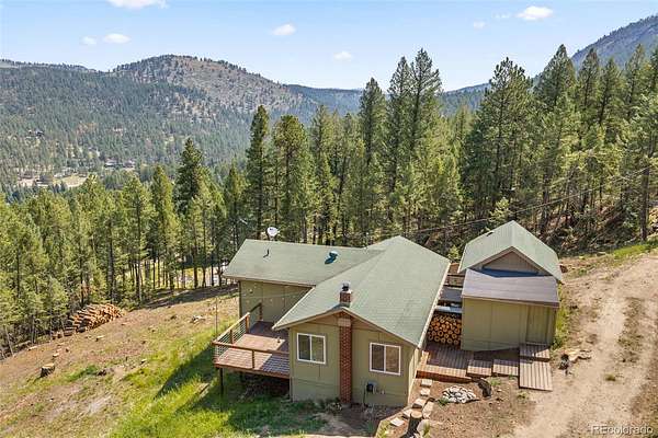 1.59 Acres of Land with Home for Sale in Evergreen, Colorado