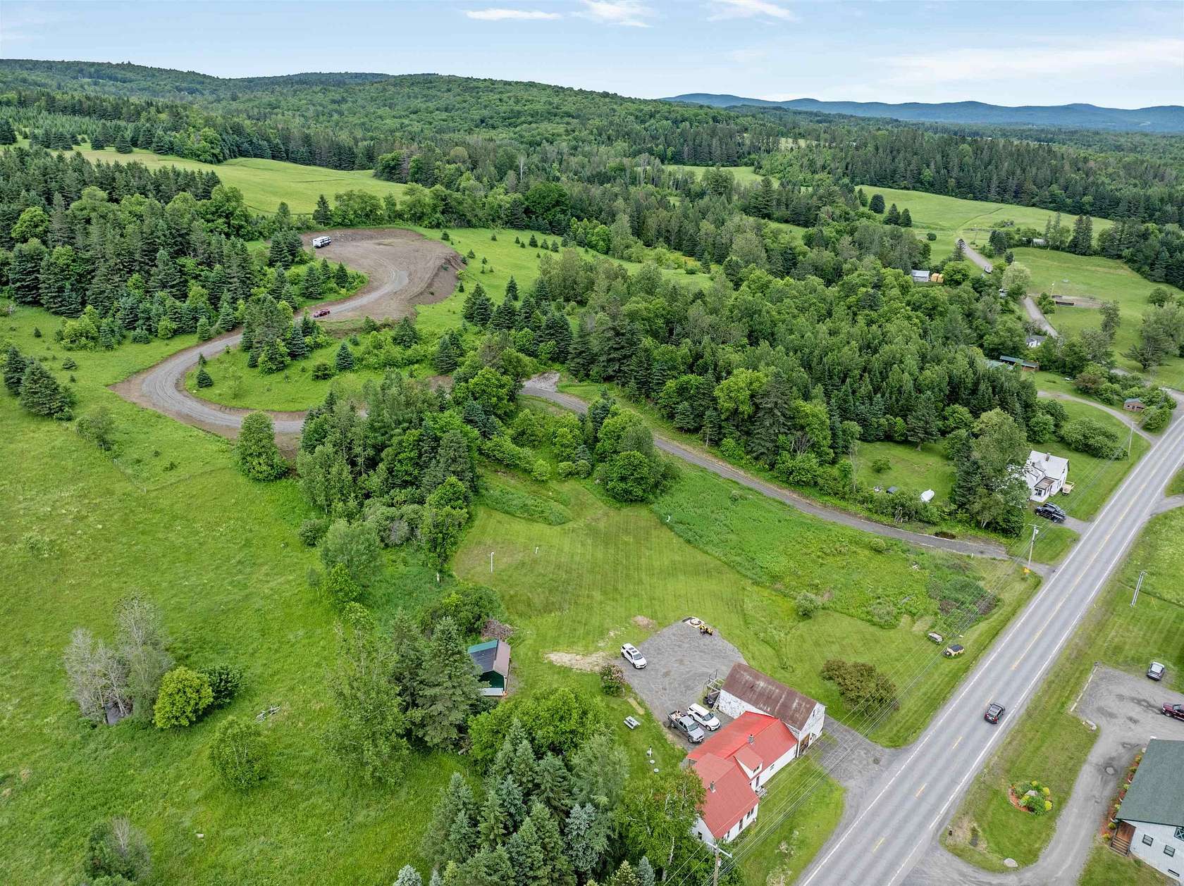 11.3 Acres of Recreational Land with Home for Sale in Colebrook, New Hampshire