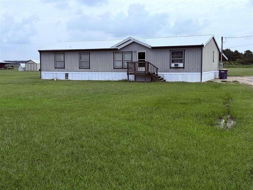 1.6 Acres of Land with Home for Sale in Jennings, Louisiana