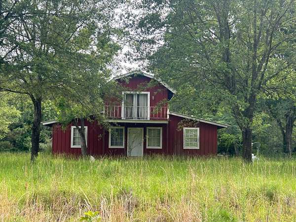 10 Acres of Land with Home for Sale in Magnolia, Arkansas