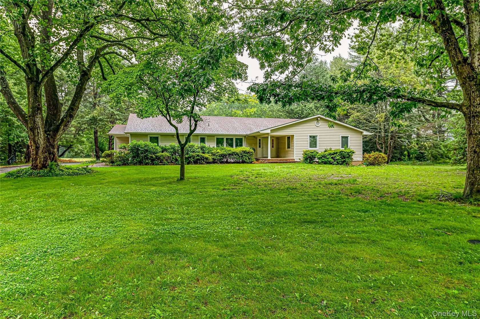 2 Acres of Land with Home for Sale in Laurel Hollow, New York