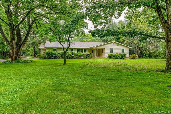 2 Acres of Land with Home for Sale in Laurel Hollow, New York