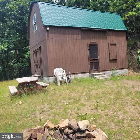 6.35 Acres of Land with Home for Sale in Great Cacapon, West Virginia