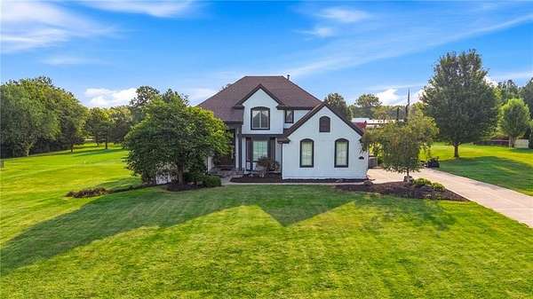 3.2 Acres of Land with Home for Sale in Belton, Missouri