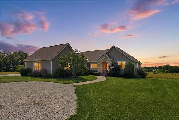 8.3 Acres of Land with Home for Sale in Harrisonville, Missouri