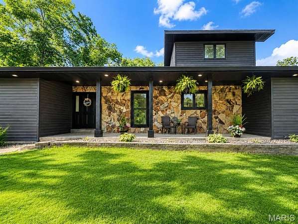 4.84 Acres of Land with Home for Sale in O'Fallon, Missouri