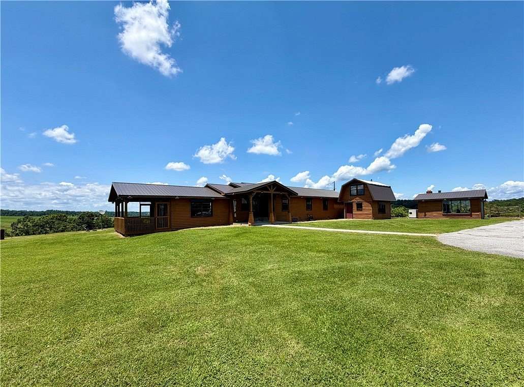 45 Acres of Agricultural Land with Home for Sale in Rogers, Arkansas