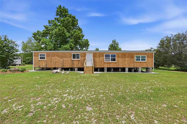 10 Acres of Land with Home for Sale in Fort White, Florida