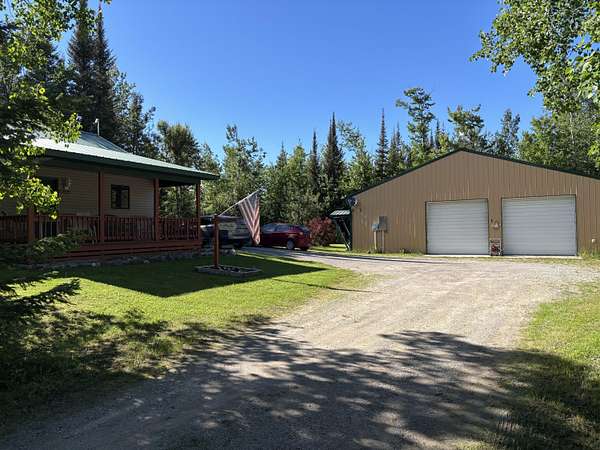 27.3 Acres of Recreational Land with Home for Sale in Hawks, Michigan