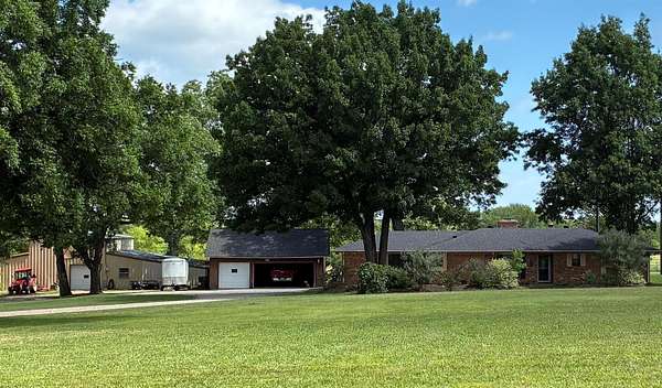 8.4 Acres of Land with Home for Sale in Denison, Texas