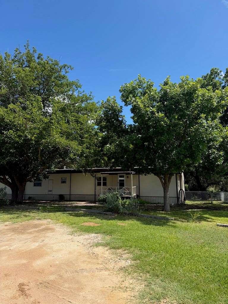 10 Acres of Recreational Land with Home for Sale in Hext, Texas
