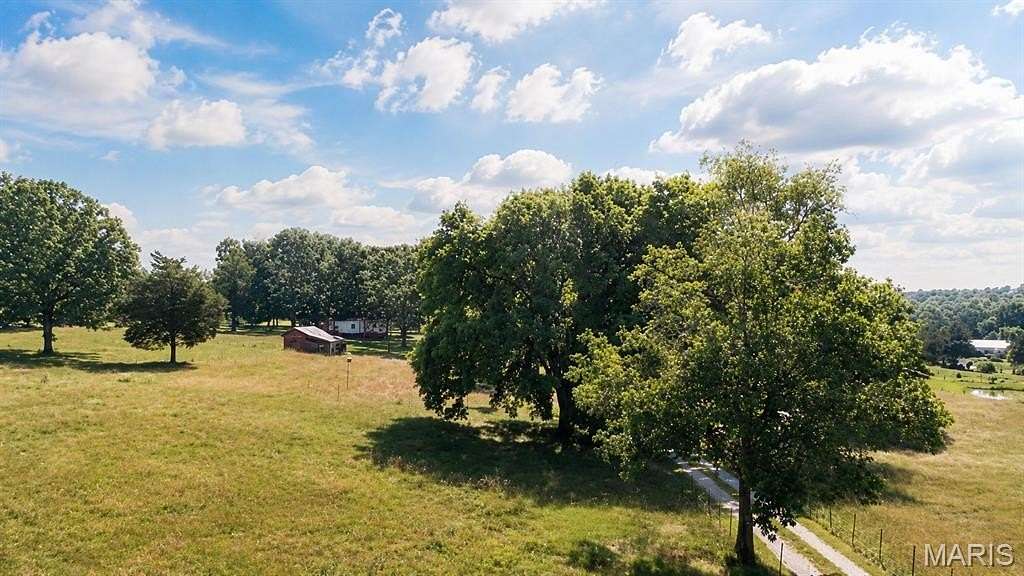 21.2 Acres of Agricultural Land with Home for Sale in Cadet, Missouri