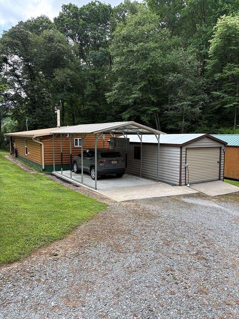 1.56 Acres of Land with Home for Sale in Ellijay, Georgia