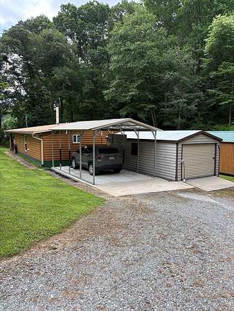 1.56 Acres of Land with Home for Sale in Ellijay, Georgia