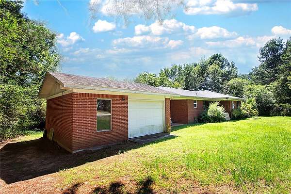 8.38 Acres of Land with Home for Sale in Dover, Arkansas