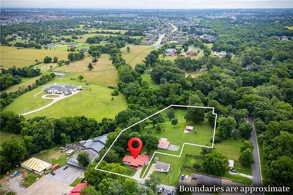 2.13 Acres of Land with Home for Sale in Cave Springs, Arkansas