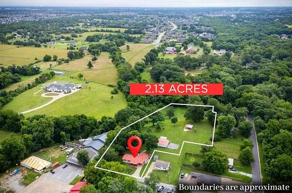 2.13 Acres of Land with Home for Sale in Cave Springs, Arkansas