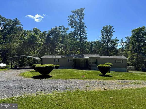 10.2 Acres of Recreational Land with Home for Sale in Augusta, West Virginia