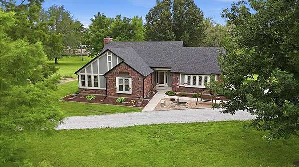 3.32 Acres of Land with Home for Sale in Peculiar, Missouri