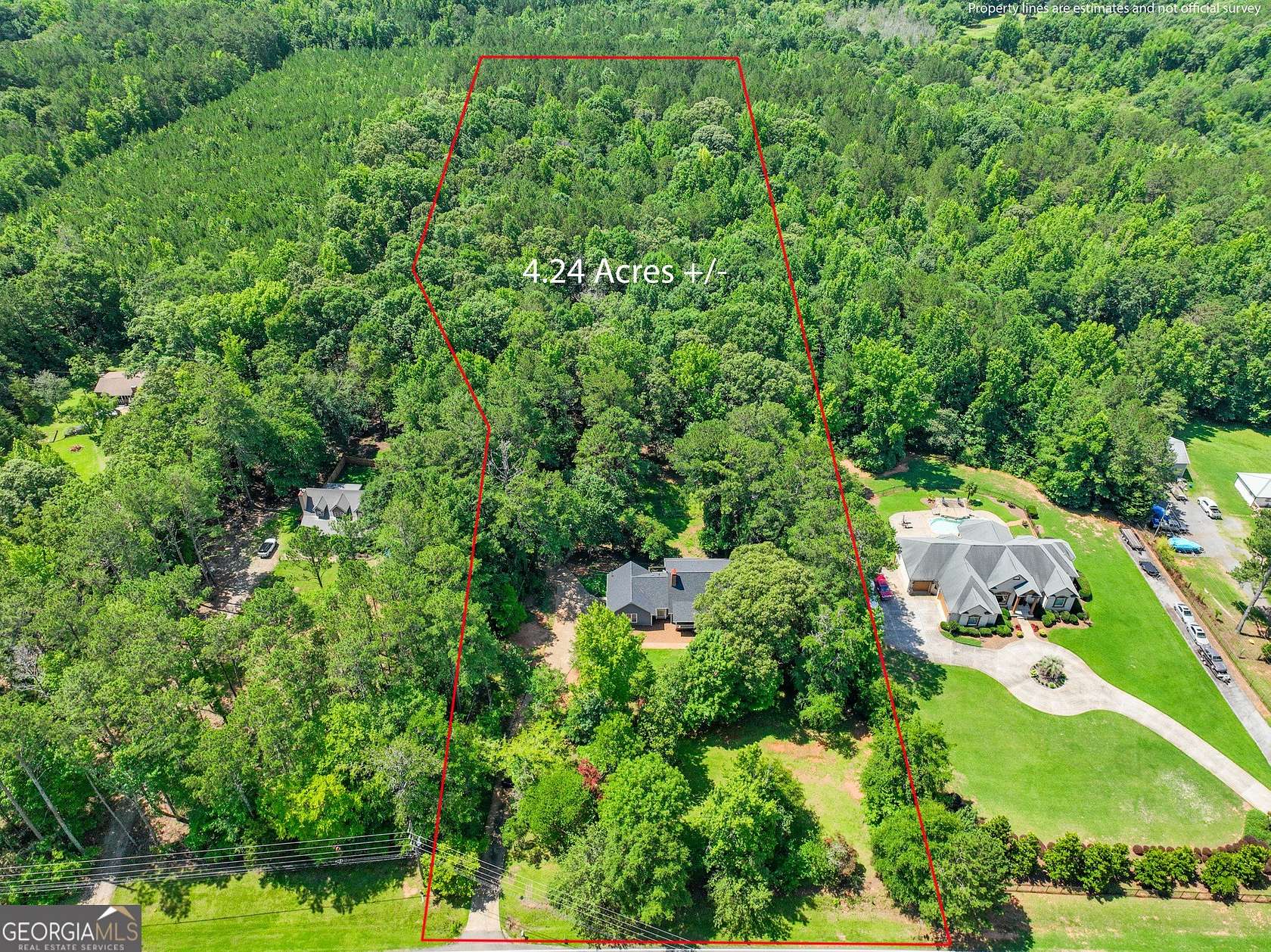 4.24 Acres of Land with Home for Sale in McDonough, Georgia
