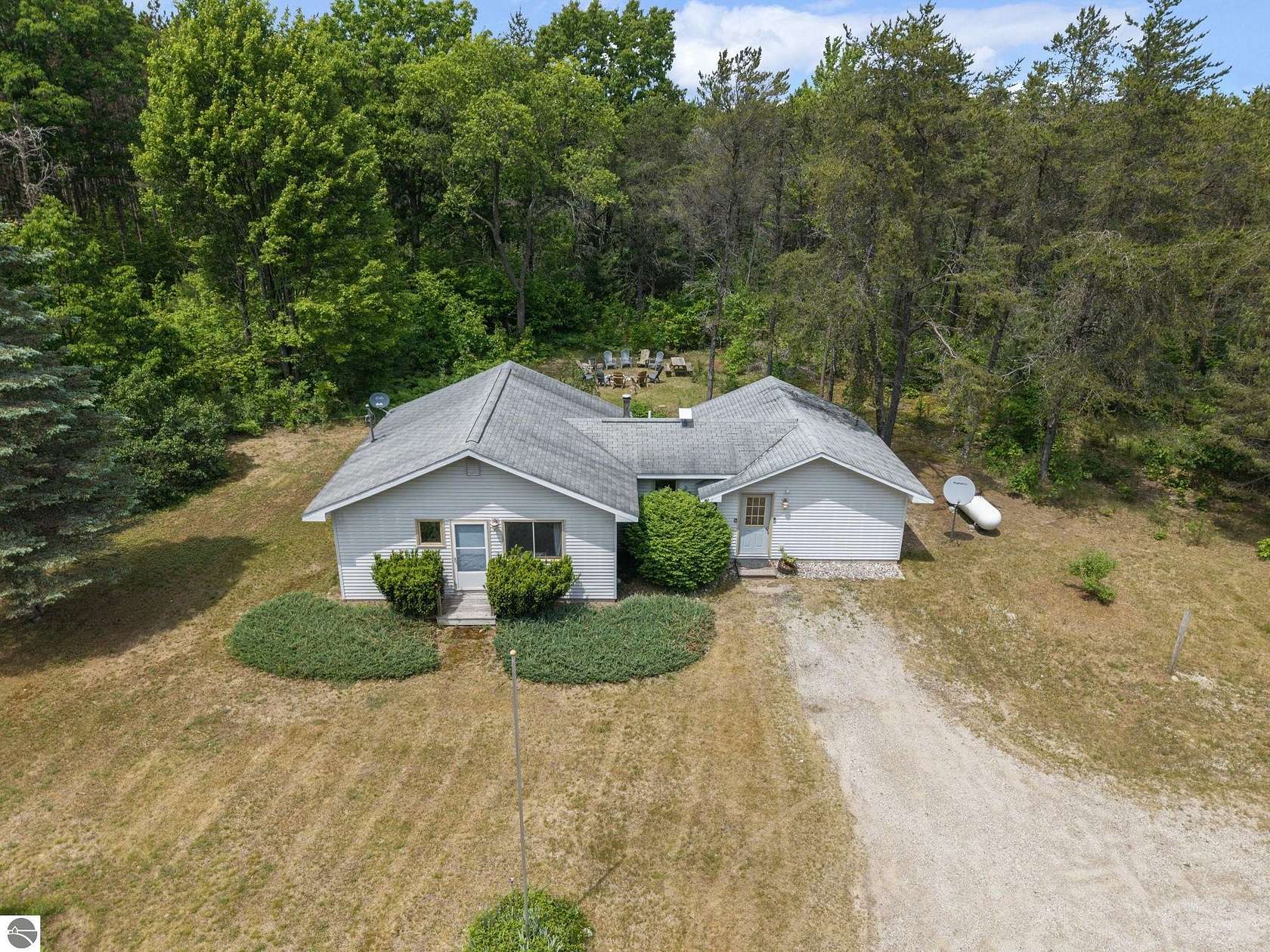 5 Acres of Land with Home for Sale in Beulah, Michigan